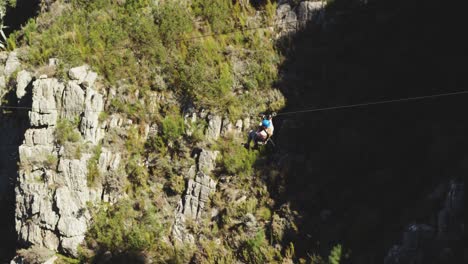 young caucasian woman zip lining