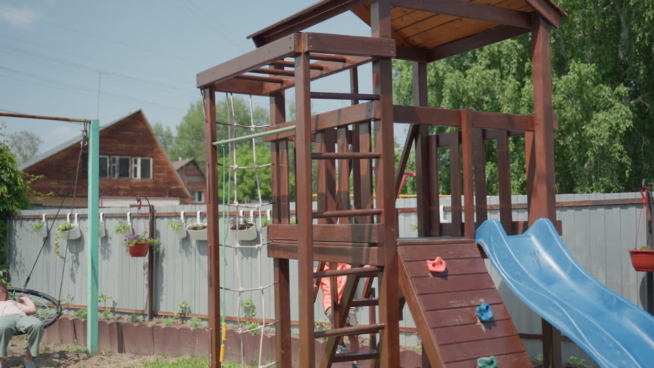 Bright Play Zone, Sunlit Outdoor Kids Activity Space, Illuminated Wooden Climbing Structure For Children, Sunny Outdoor Playground Equipped With Slides And Climbing Features For Children