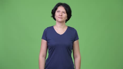 happy beautiful woman with short hair thinking