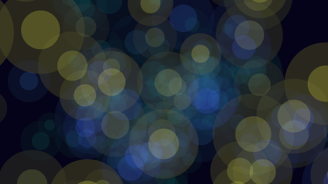 The image showcases a composition of varied blue and yellow circles on a dark backdrop, arranged in a random formation, some overlapping