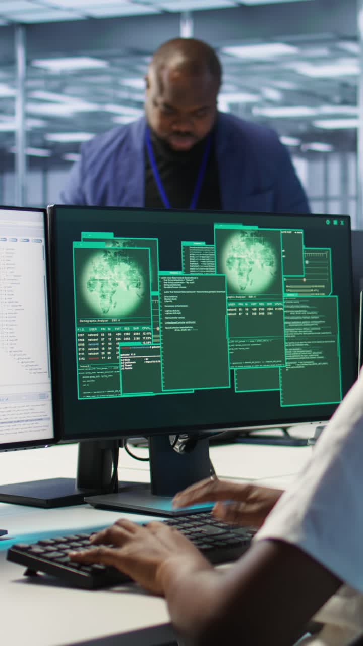 Vertical video Woman seeing critical error on PC screen in data center