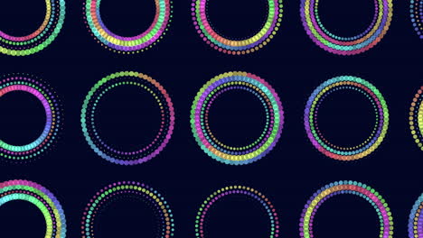 patrón de círculos de neón con arco iris y puntos aleatorios en degradado negro 1