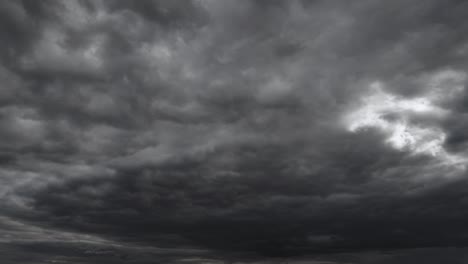 background of dark dramatic sky with stormy clouds timelapse before rain or snow, extreme weather