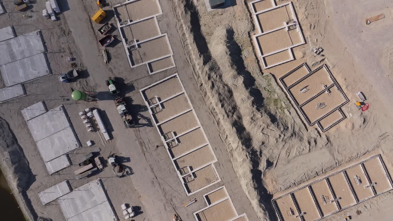Aerial view of construction crews working on homes in Obdam
