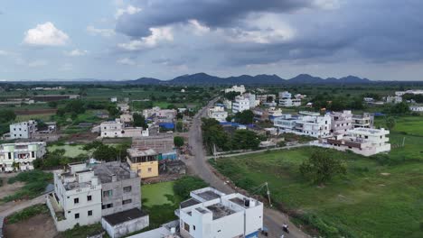 a breathtaking aerial perspective of vijayawada, where the city's modern development meets the beauty of nature.