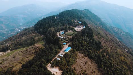 aerial view of greenery mountain hill in panchthar, nepal.