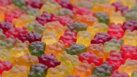 full frame looped spinning background of colorful jelly bear candies