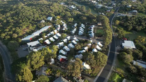 australian resort area with houses in preston beach town near ocean at sunset