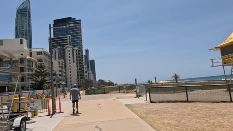 people enjoying a sunny day at a beach promenade