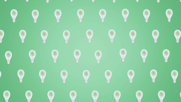 Animation of multiple falling light bulbs with trees inside on green background