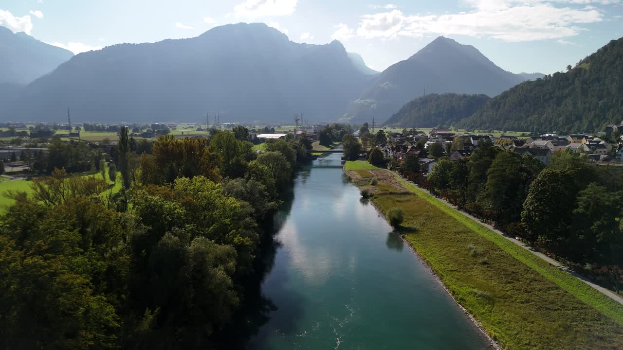 Amden city lake Walensee river diverted Switzerland, aerial mountains skyline