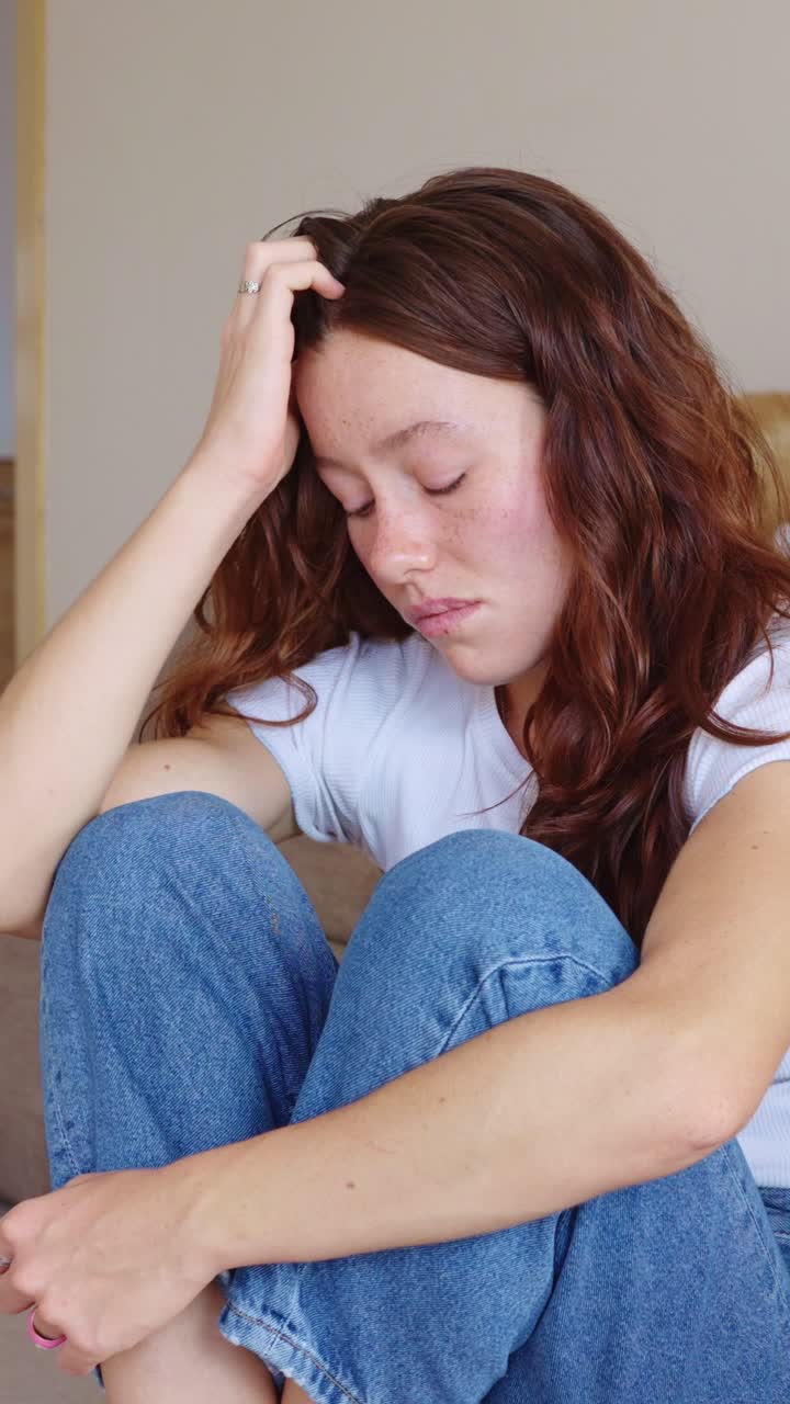 A woman expressing sadness and depression