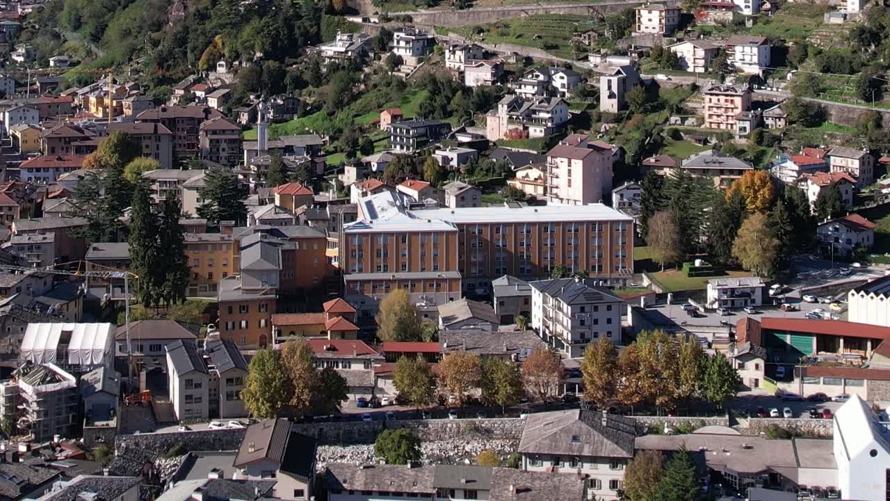 Stunning aerial view of a town nestled in the Italian Alps