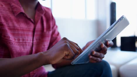 Handsome-African-american-male-executive-using-digital-tablet-in-modern-office-4k