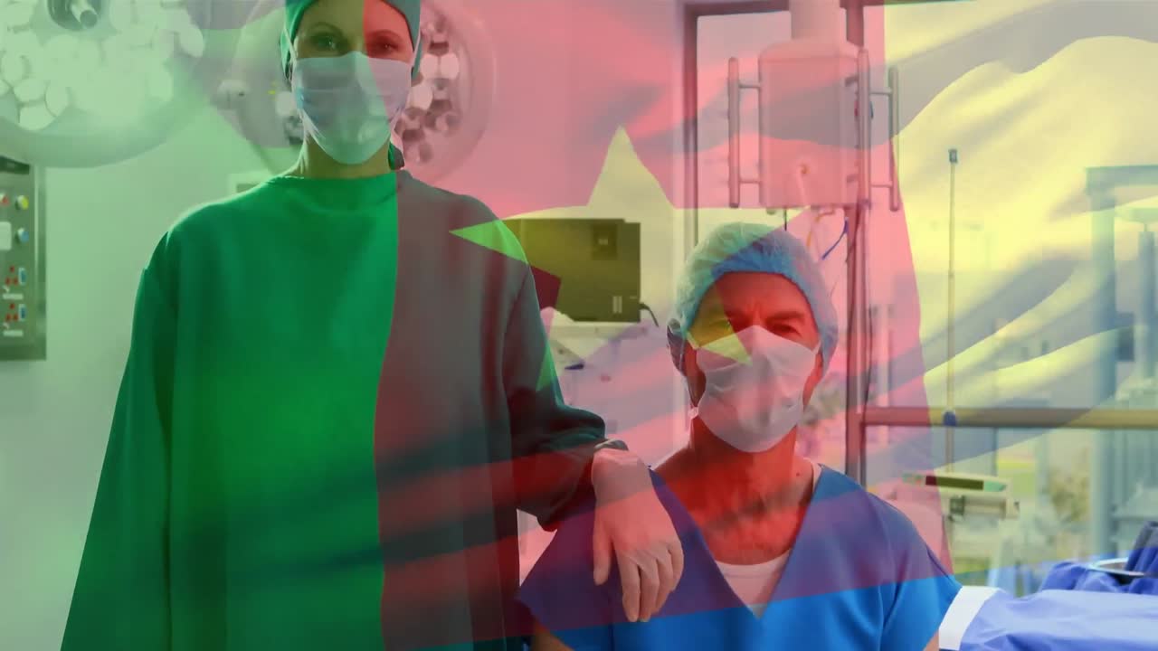 animación de la bandera de camerún ondeando sobre los cirujanos con máscaras faciales