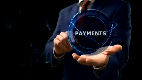 businessman shows concept hologram payments on his hand