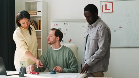 Teacher-and-students-in-driving-school