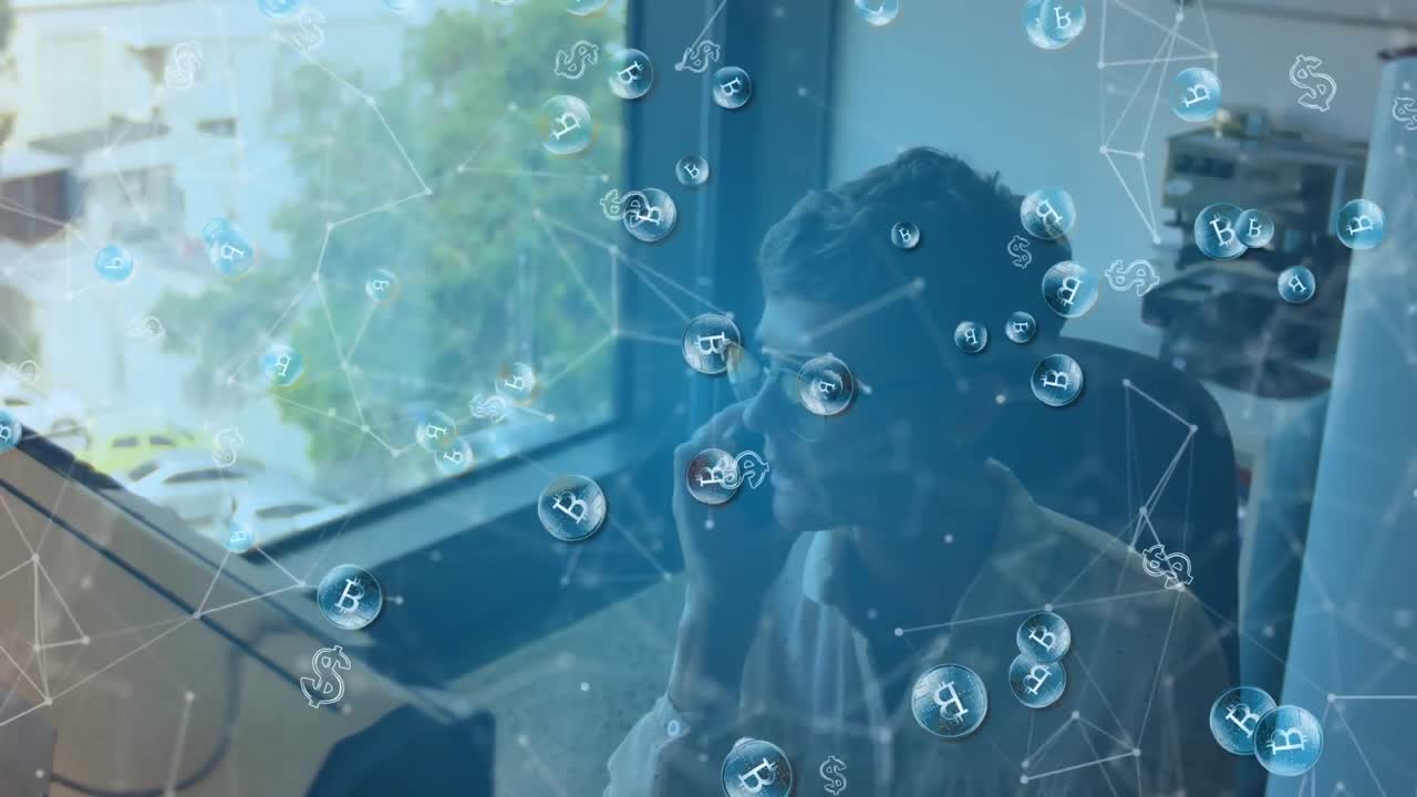 연락처와 비트코인 아이콘의 애니메이션이 사무실에 있는 백인 사업가