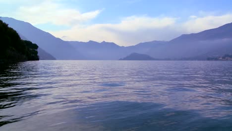 a water level view of a beautiful mountain lake