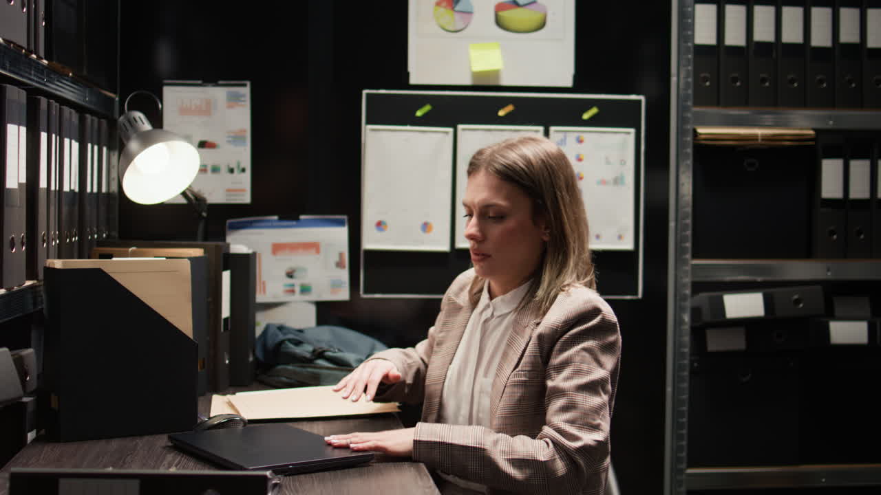 Businesswoman Working at Desk in Office