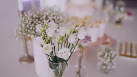 exquisite white flowers in a vase for a sophisticated table setting