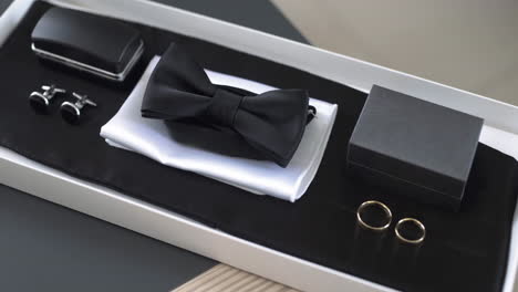 elegant men's accessory set with bow tie and cufflinks