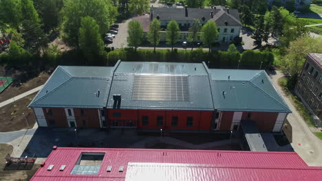 aerial view of solar panels on rooftop of