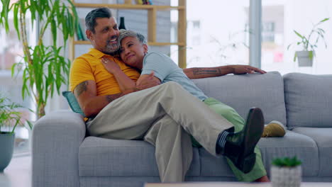 Talking,-hug-and-happy-elderly-couple-cuddle