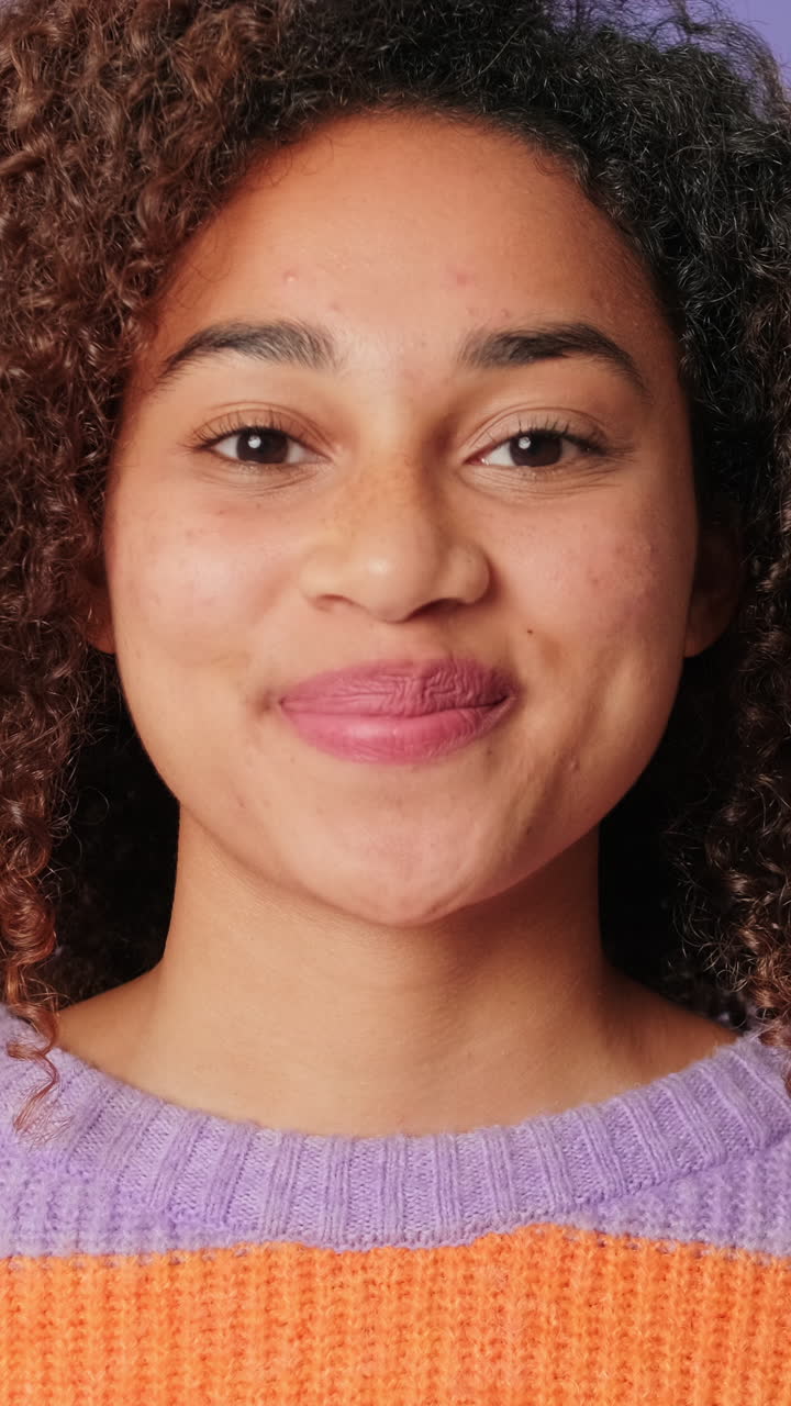 Close Up of Young Woman Opening Eyes and Smiling