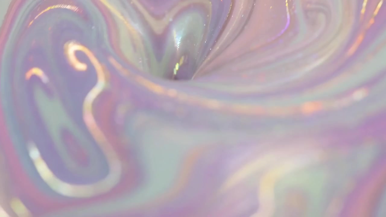 Dynamiske iriserende pastelfarvede hvirvler med glitrende glimmer