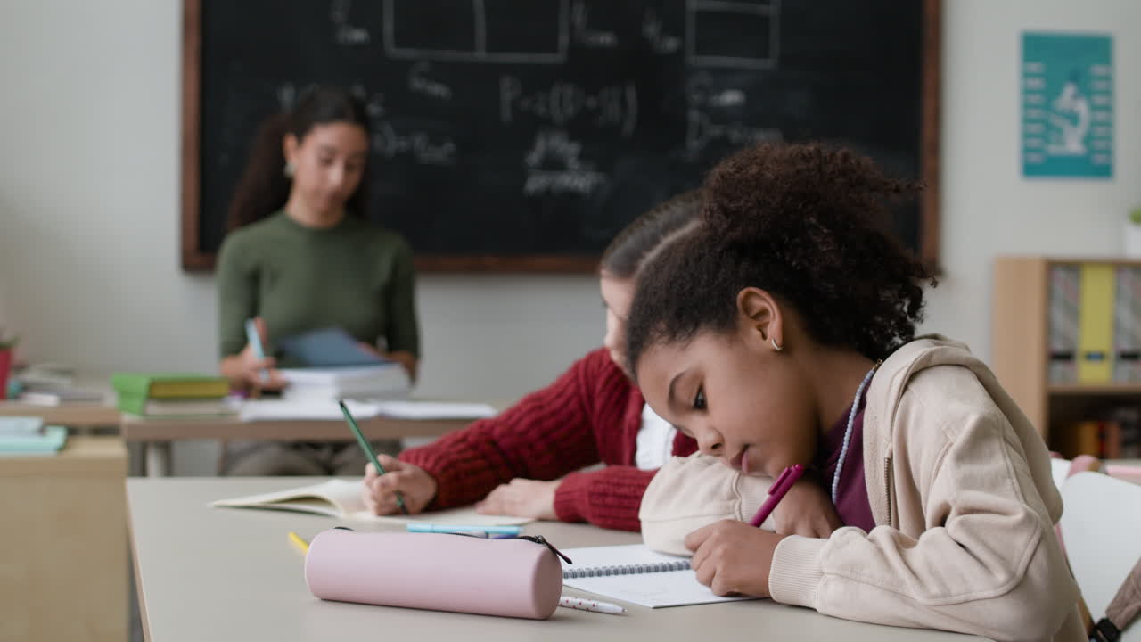 Elementary School Students Studying in Class