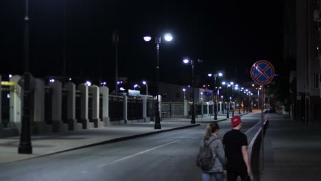 empty street at night with people