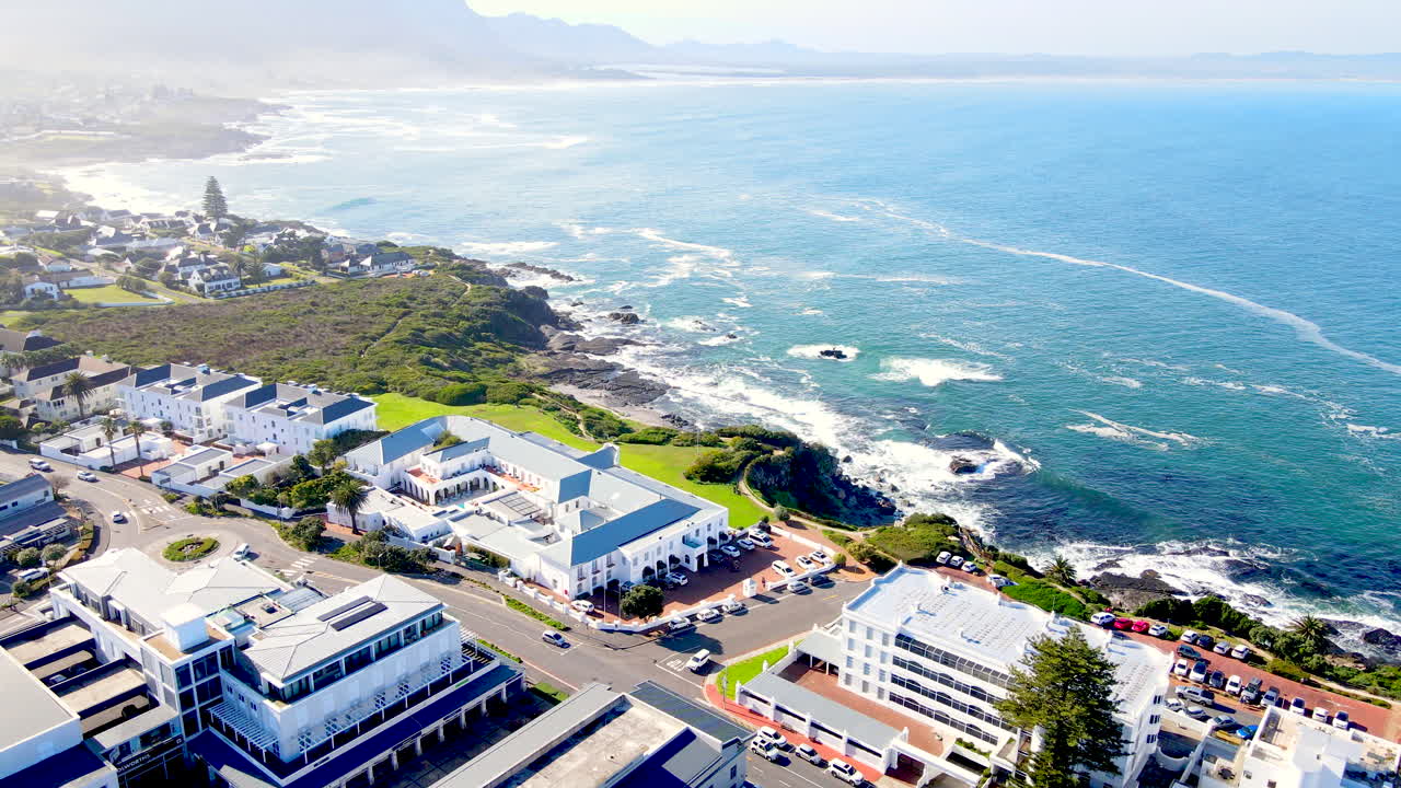 Drone view over Hermanus CBD and rugged coastline of Walker Bay