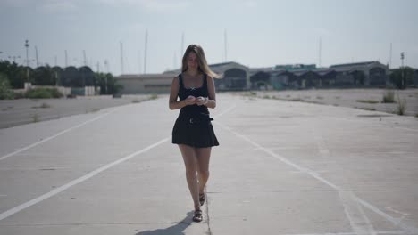 woman walking on an empty street