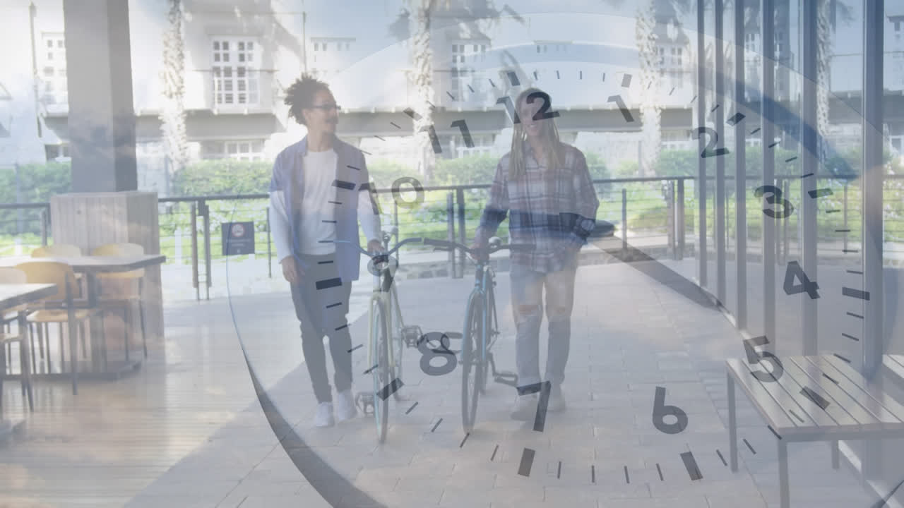 Animation of clock rotating over african american friends with bicycles walking on footpath in city