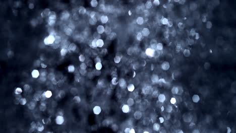 silver bokeh texture loop with defocused lights