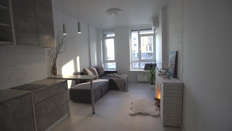 Modernes,-Minimalistisches,-Dunkelgraues-Studio-Apartment-Innendesign-Im-Loft-Stil.-Küche,-Sitzecke,-Arbeitsplatz