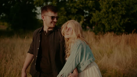 Joyful-Couple-Walking-And-Smiling-Outdoors-In-Summer-7