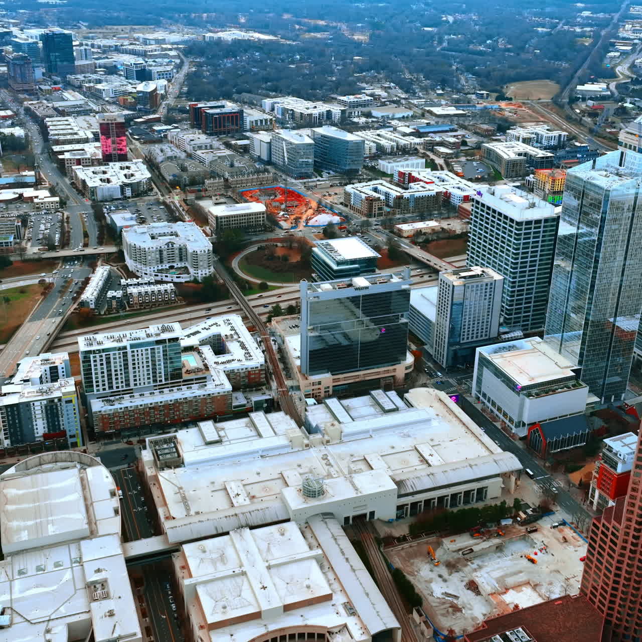 Dense architecture of a modern city on cloudy day. Top perspective on Charlotte, NC, USA