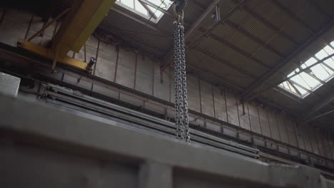 industrial warehouse interior with lifting chain