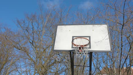 the tall basketball ring on the playground