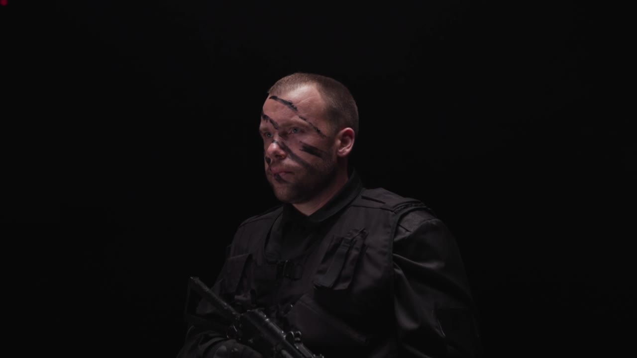 Man with Face Paint and Black Clothes