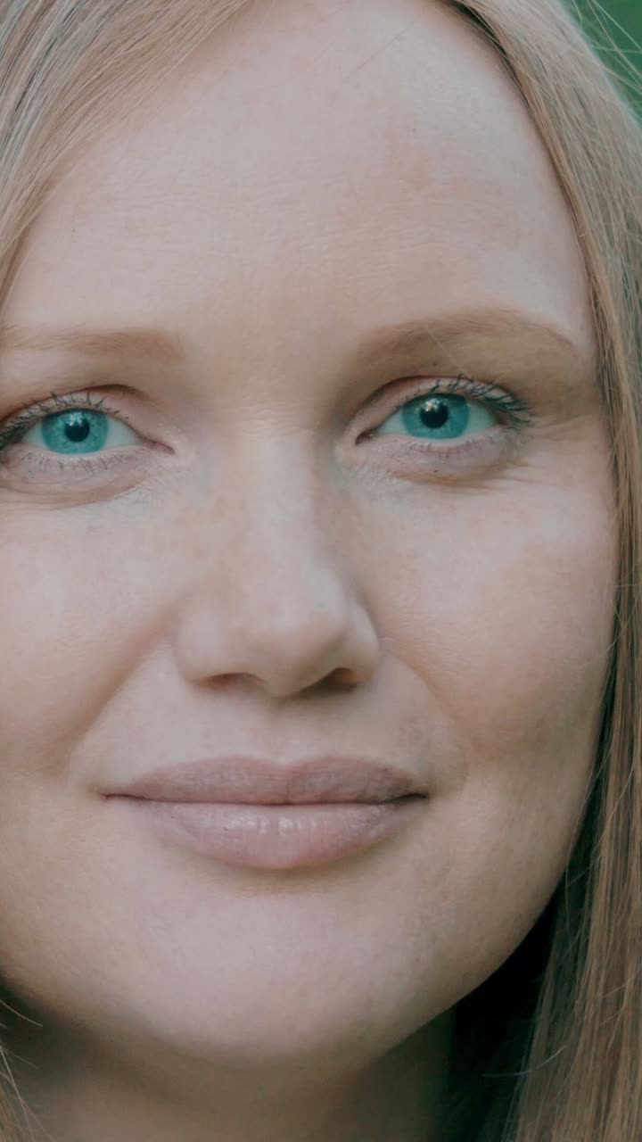 Close-up portrait of a woman with blue eyes