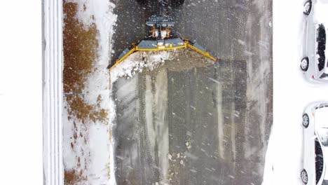 Aerial-View-Of-Snow-Removal-During-Snowfall-In-Winter-In-Longueuil,-Canada