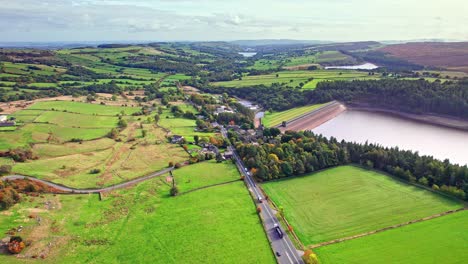 aerial footage panning across langsett reservoir near barnsley and yorkshire countryside