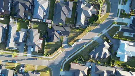 Descending-drone-footage-of-houses-in-a-modern-subdivision-of-Rangiora-town-New-Zealand