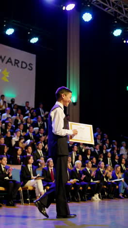 student receiving award at science awards ceremony