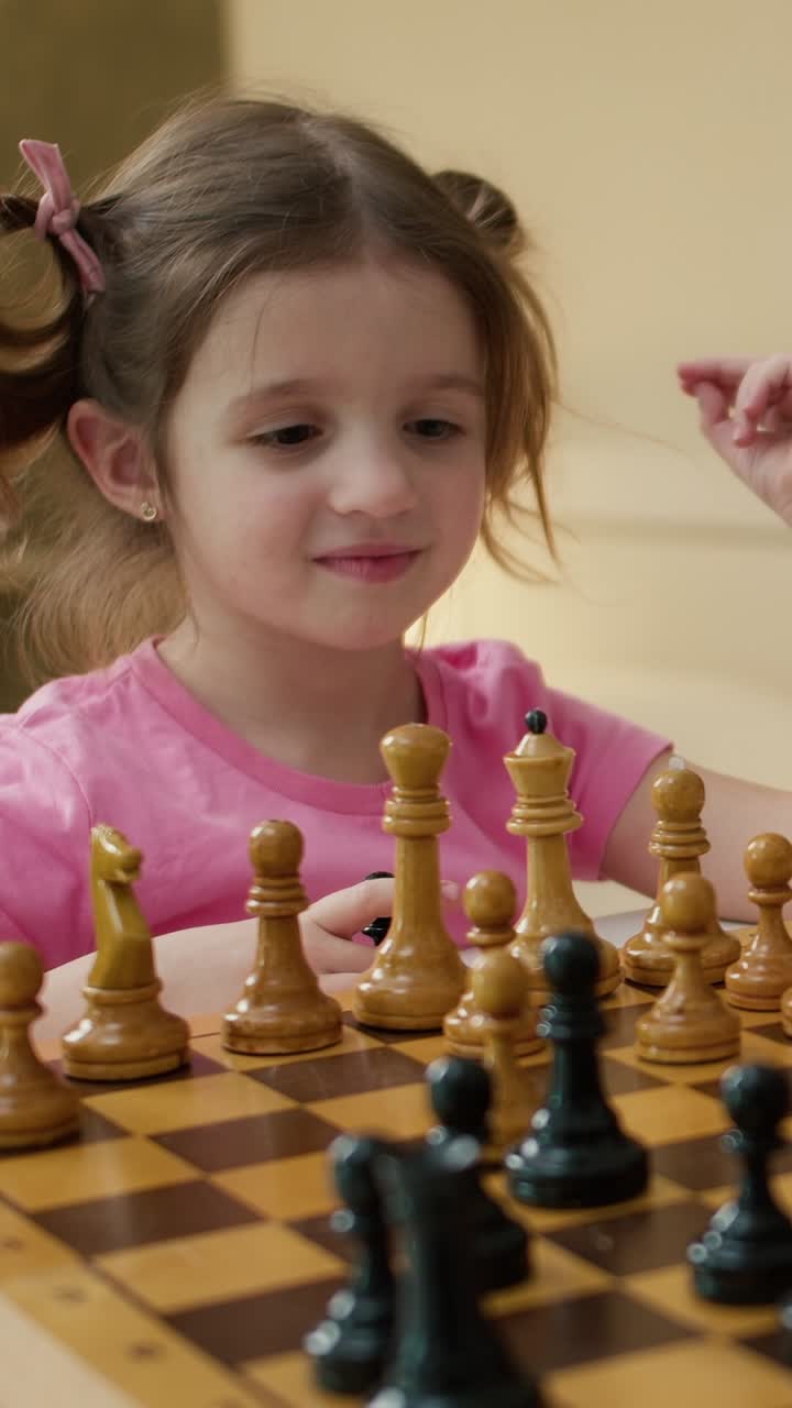 Young Girl Playing Chess
