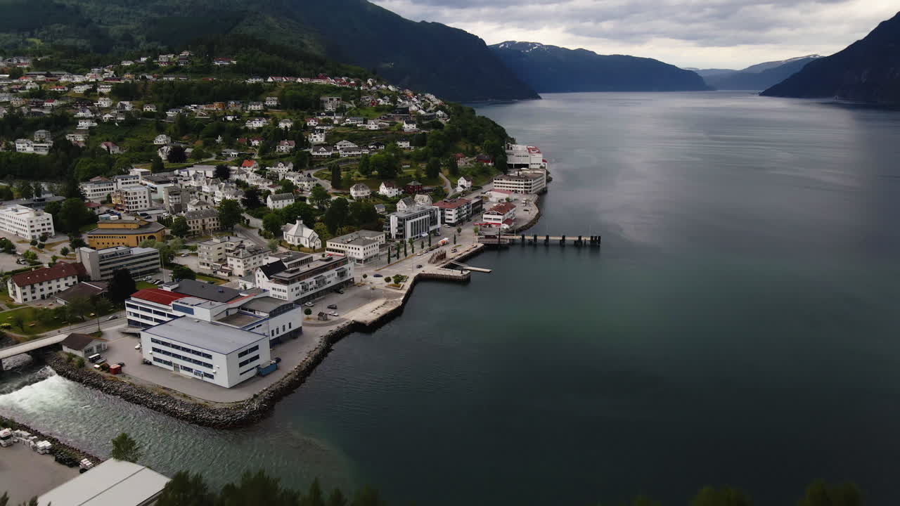 Aerial shot of a small town called Stranda in Norway with the fjord in the summer