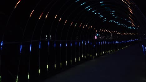 led lighting festival in the park tunnel – multi-colored